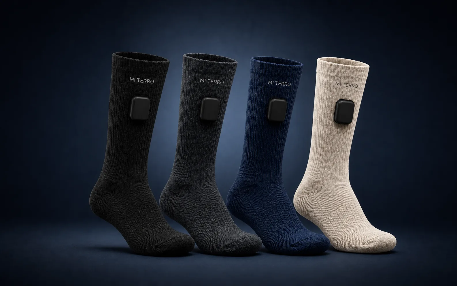 Four Mi Terro Smart Socks in black, gray, navy, and cream with detachable sensing modules